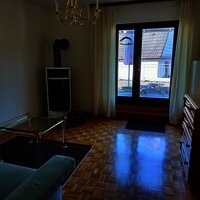 Eingang und Kaminzimmer der Ferienwohnung