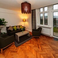 Villa Mosella 1 Wohnzimmer Balkon zur Mosel